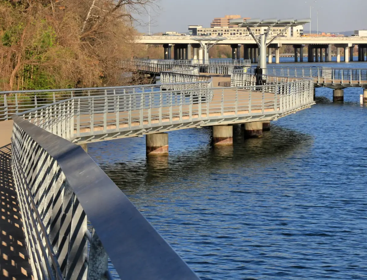 The Ann and Roy Butler boardwalk curving over Lady Bird Lake on Austin's southeast shore